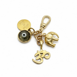 Evil Eye, Elephant, and Hindu Peace Symbol Charm Cluster