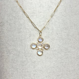 Gold, Moonstone, and Diamond Cross Enhancer