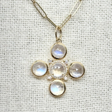 Gold, Moonstone, and Diamond Cross Enhancer