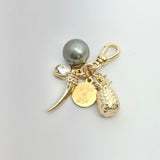 Tahitian Pearl, Horn, and Pineapple Charm Cluster