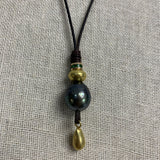 Mid-length | Tahitian Pearl w/ Gold & Emerald