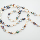 Sautoir | Tri-colored small baroque pearl on leather